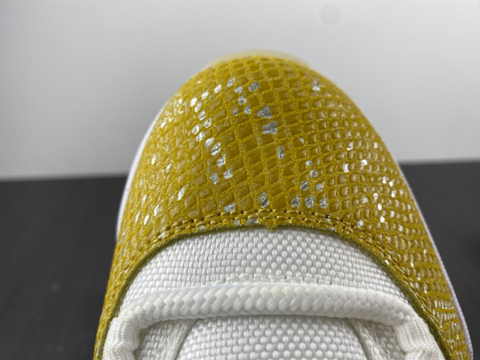 air jordan 11 low “yellow snakeskin” ah7860-107