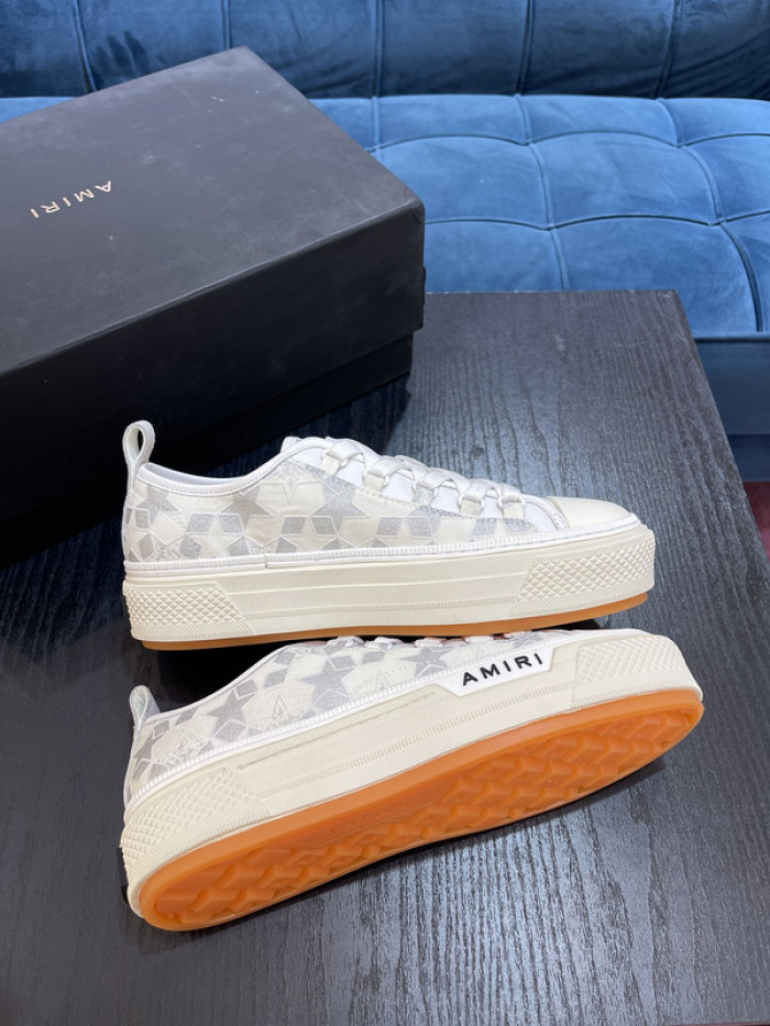 amiri* appliquéd leather and canvas sneakers