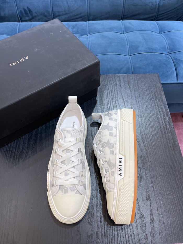 amiri* appliquéd leather and canvas sneakers